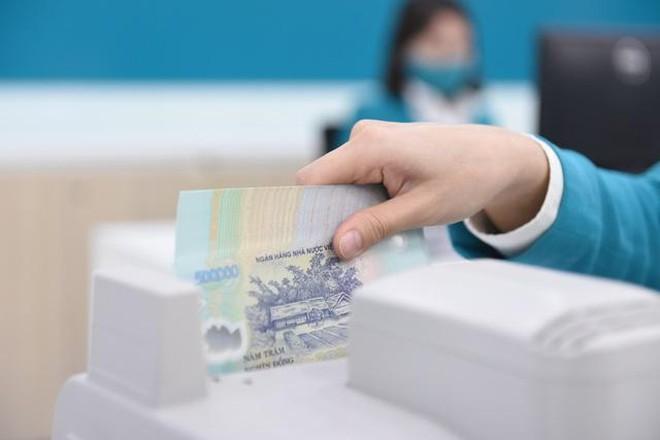 Các ngân hàng dự báo mặt bằng lãi suất tăng nhẹ trong năm 2022 ảnh 1