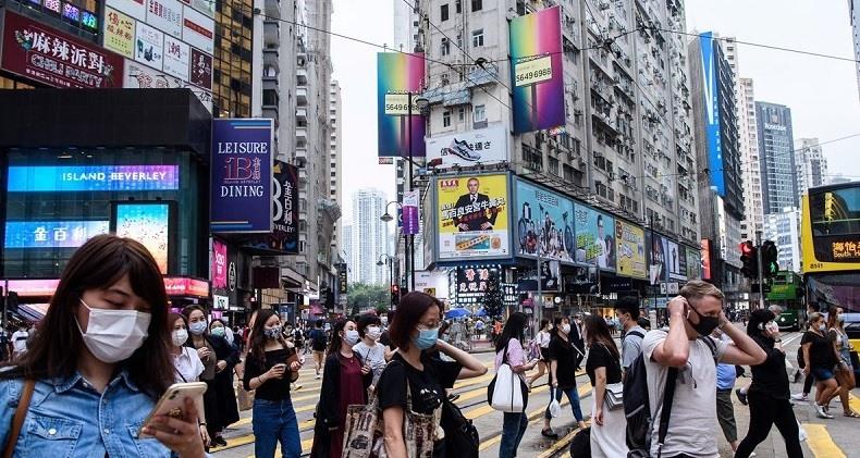 Hong Kong đang nới lỏng các biện pháp giới hạn do COVID-19. Ảnh: AFP.