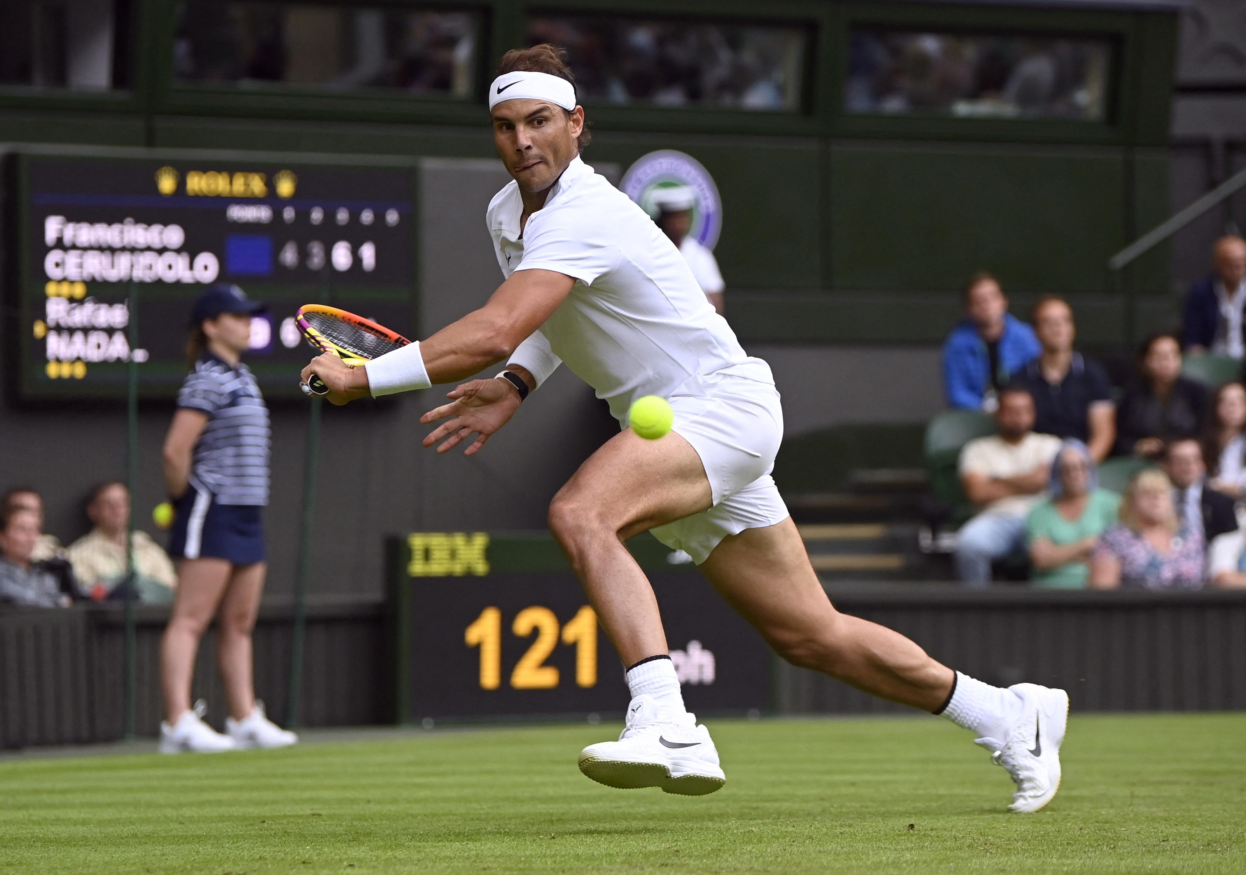 Nadal chơi trận sân cỏ đầu tiên kể từ năm 2019. Ảnh: Reuters.