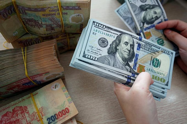 Tiền VND tăng giá so với USD